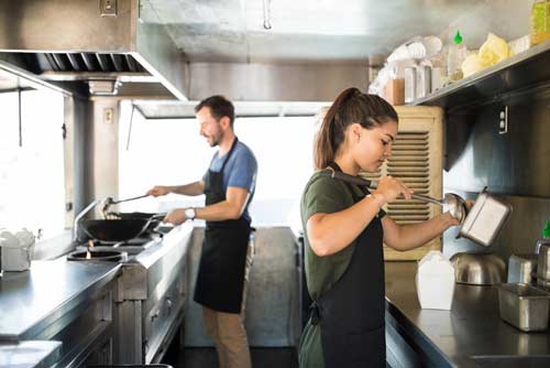 Food truck workers in action