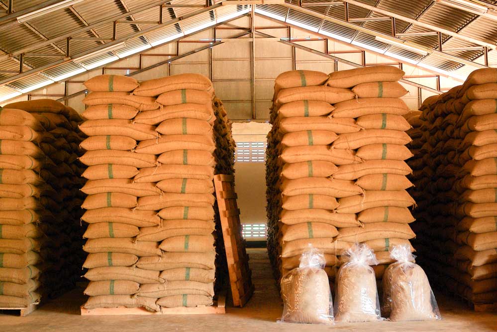 coffee bags stacked in a warehouse