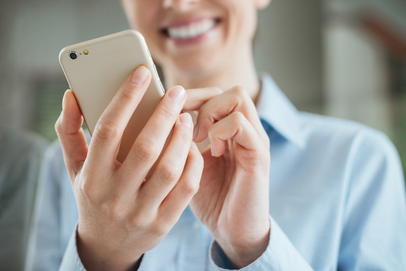 Woman looking at smartphone